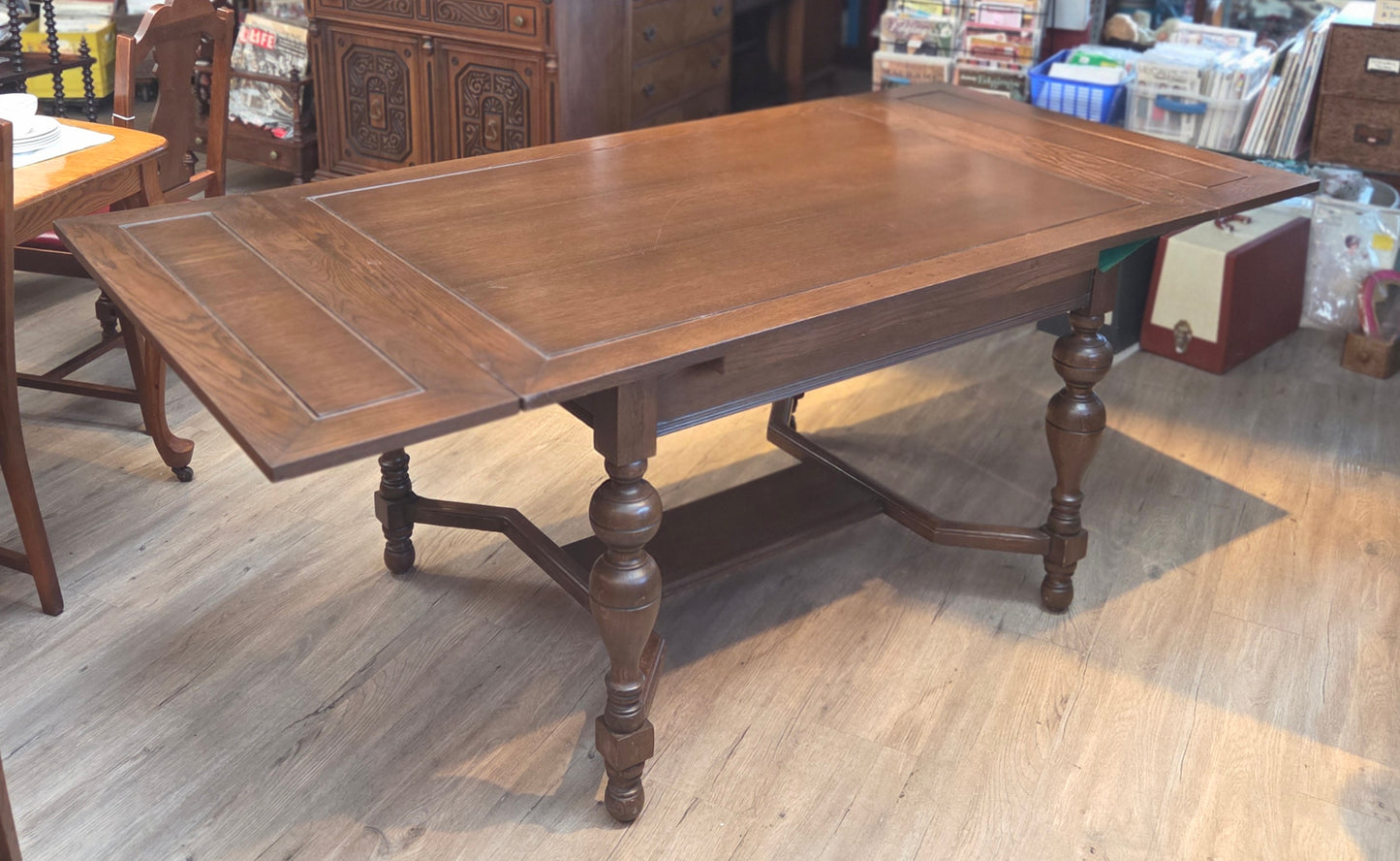 Oak draw-leaf dining table