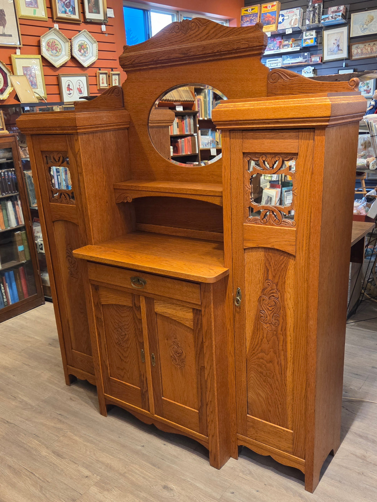 Break-front oak cabinet/entrance piece