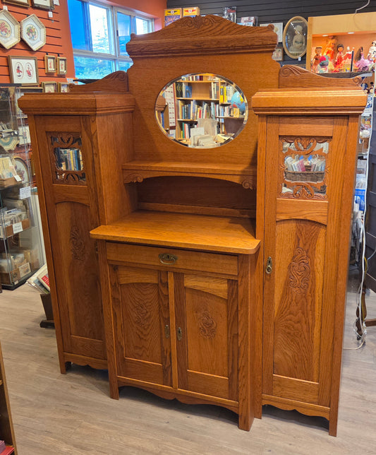 Break-front oak cabinet/entrance piece