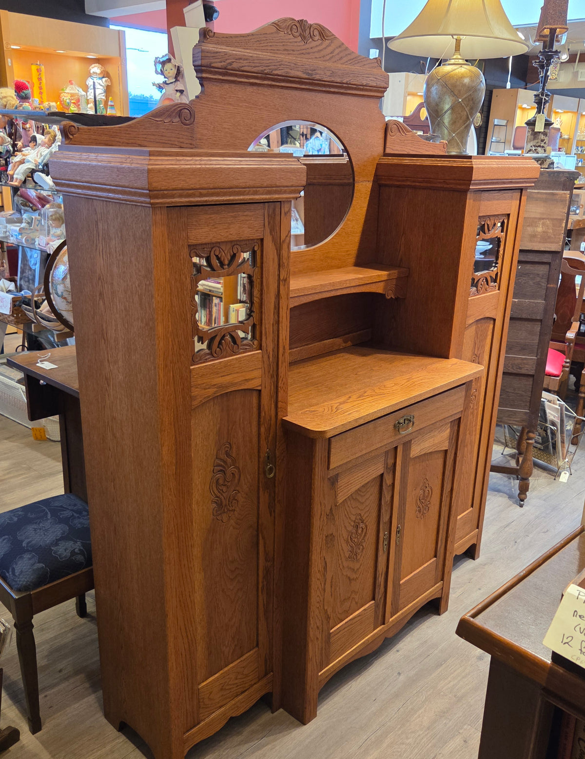 Break-front oak cabinet/entrance piece