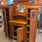 Break-front oak cabinet/entrance piece