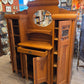 Break-front oak cabinet/entrance piece