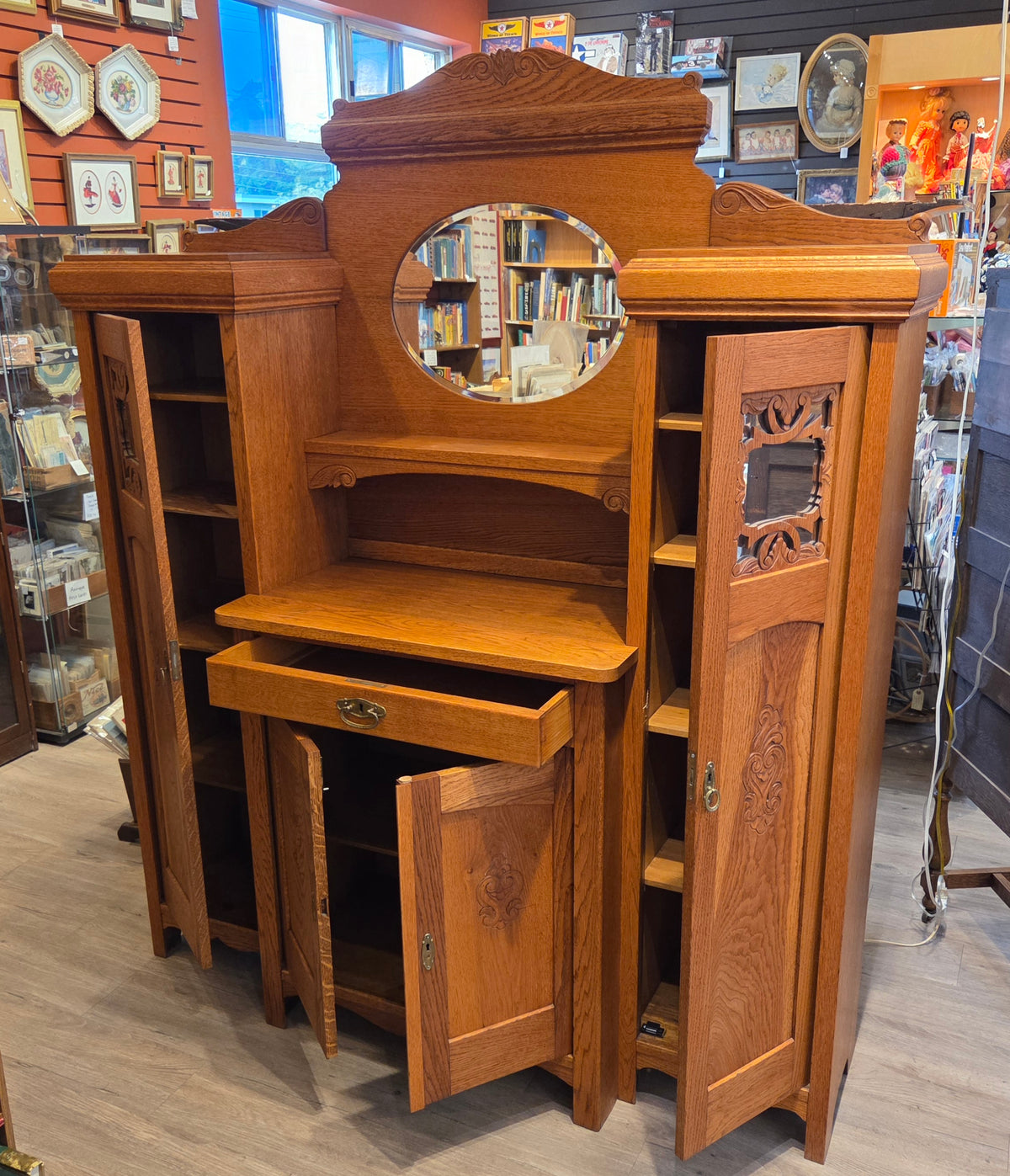 Break-front oak cabinet/entrance piece