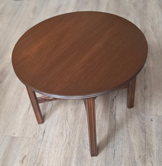 Round four legged coffee table