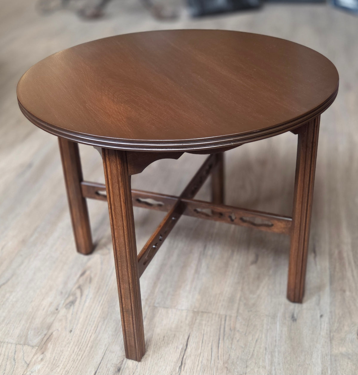 Round four legged coffee table