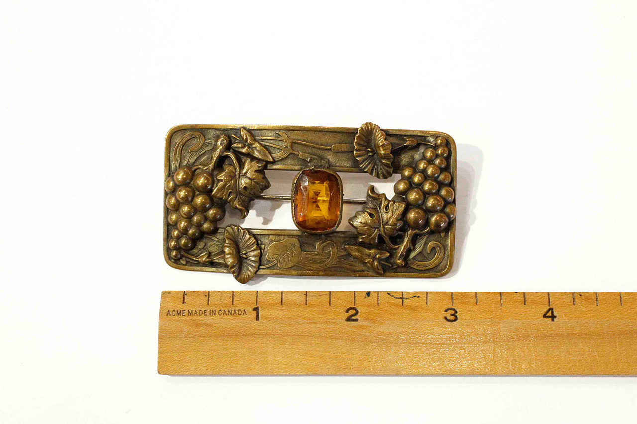 Victorian sash brooch - amber glass
