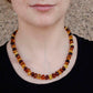 A non-vintage amber necklace fit for that someone with a unique sense of style.
Measuring eighteen inches long this hand knotted string of beautiful multicolored irregular amber beads is finished with a 925 silver lobster clasp to make it easy to slip on and off for the day.

Originated from Poland (Baltic), best quality natural amber.

These amber beads measure ~10mm or less.

JN58490