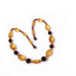 Faceted amber necklace of faceted amber beads in three colours.