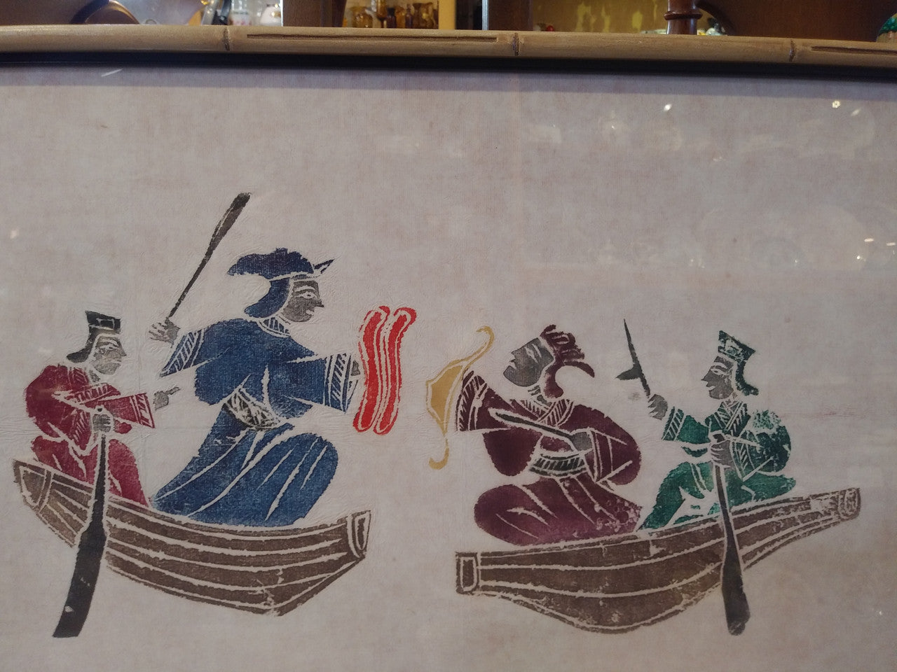 Wood framed oriental silk screen (?) print - two boats, multicolour