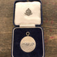Navy, Army & Airforce Institutes vintage sterling silver swimmer medallion, case